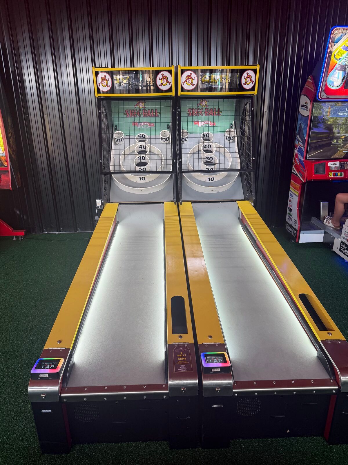 A bank of arcade cabinets at Platform 32